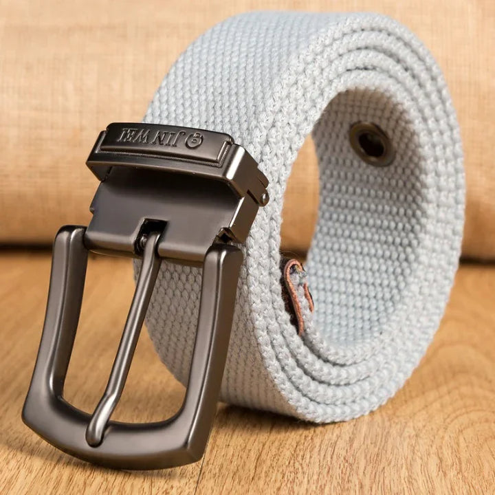 Light gray woven fabric belt with dark metal buckle on wooden surface