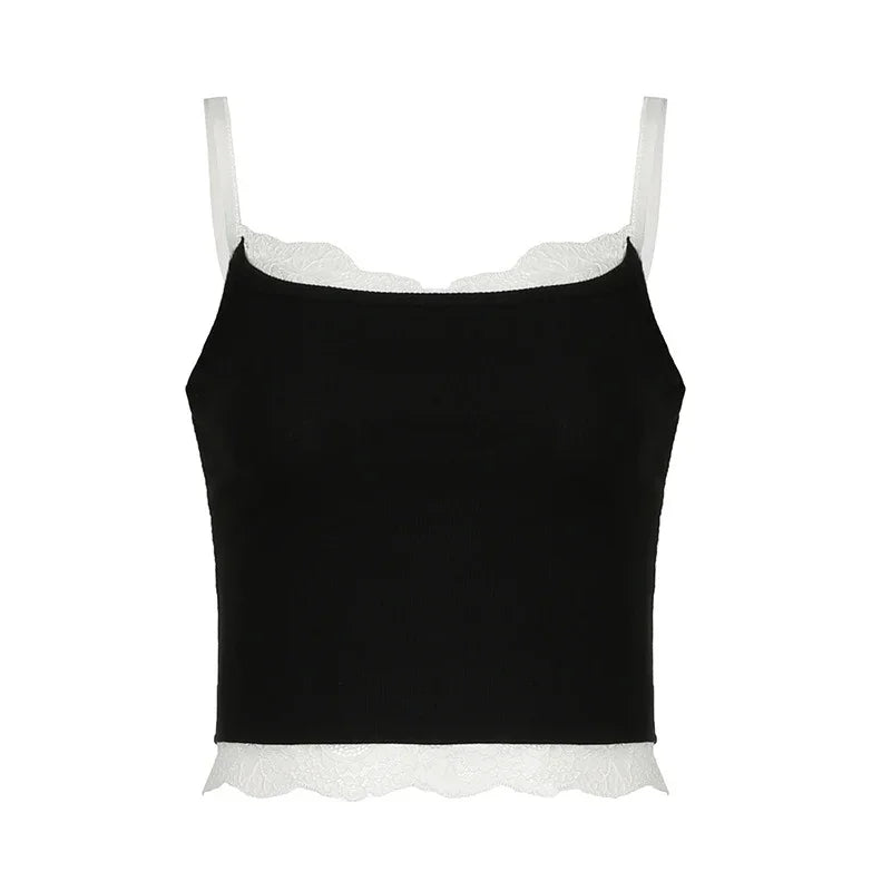 Black cropped cami top with white lace trim and adjustable white straps on white background