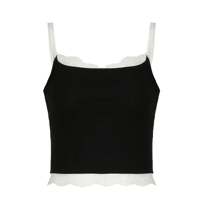 Black cropped cami top with white lace trim and adjustable white straps on white background