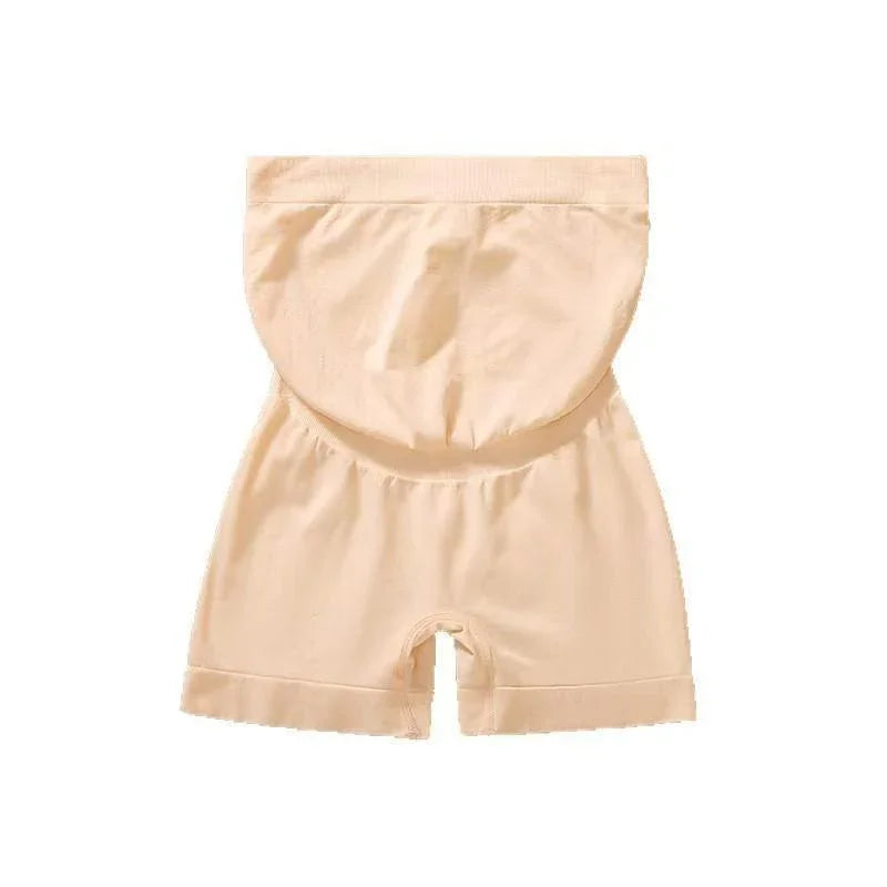 Beige high-waisted shapewear shorts with tummy control and seamless design