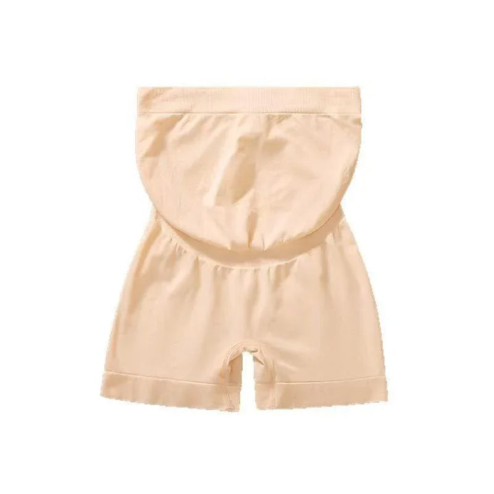 Beige high-waisted shapewear shorts with tummy control and seamless design