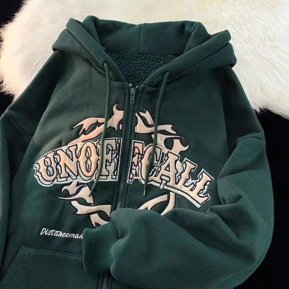 Dark green zip-up hoodie with beige flame design and 'UNOFFICIAL' text on front