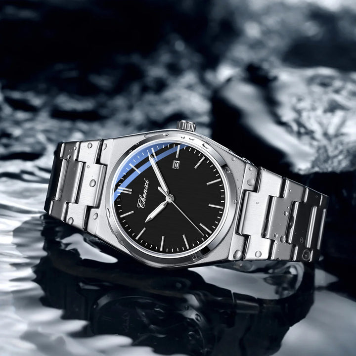 Silver Chenxi wristwatch with black dial and date on wet reflective surface