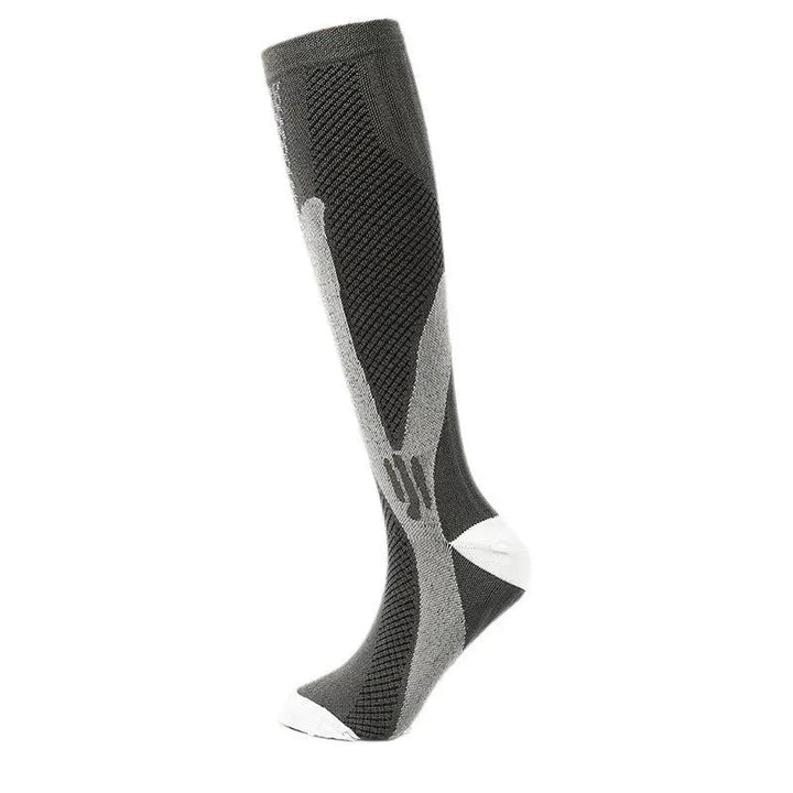 black and gray knee-high compression sock with white toe and heel accents