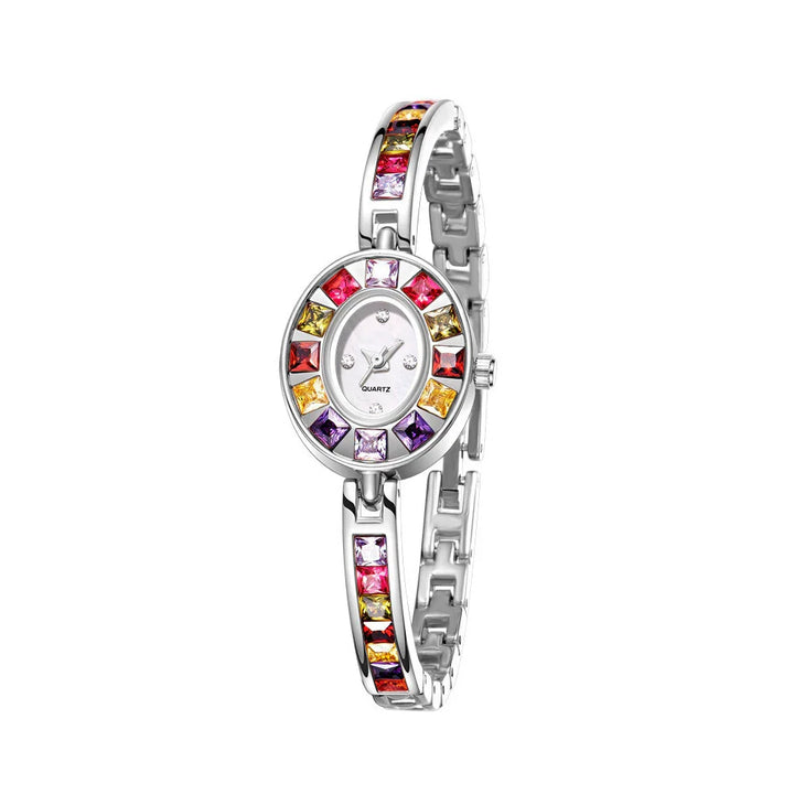 Elegant silver quartz wristwatch with multicolored square gemstones on bezel and bracelet