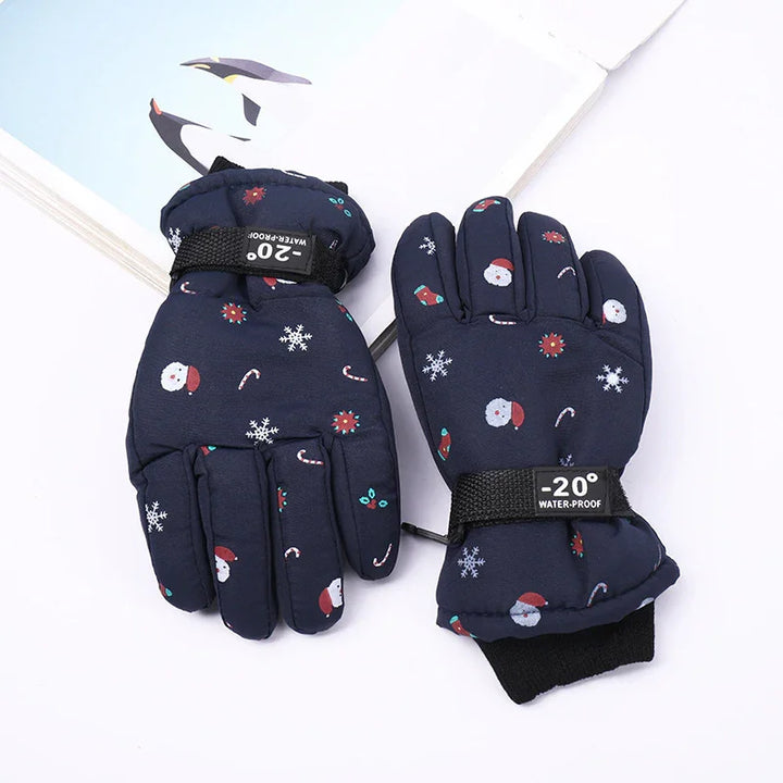 Pair of navy blue waterproof winter gloves with Santa, snowflake, and candy cane patterns, -20° rating