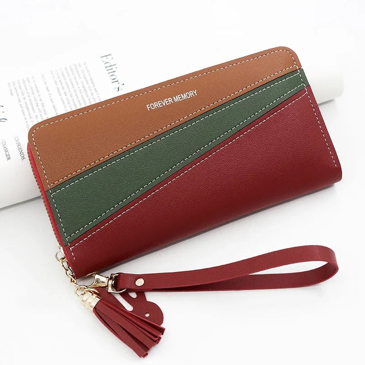 Tri-color leather wristlet wallet in red, green, and brown with tassel and FOREVER MEMORY text