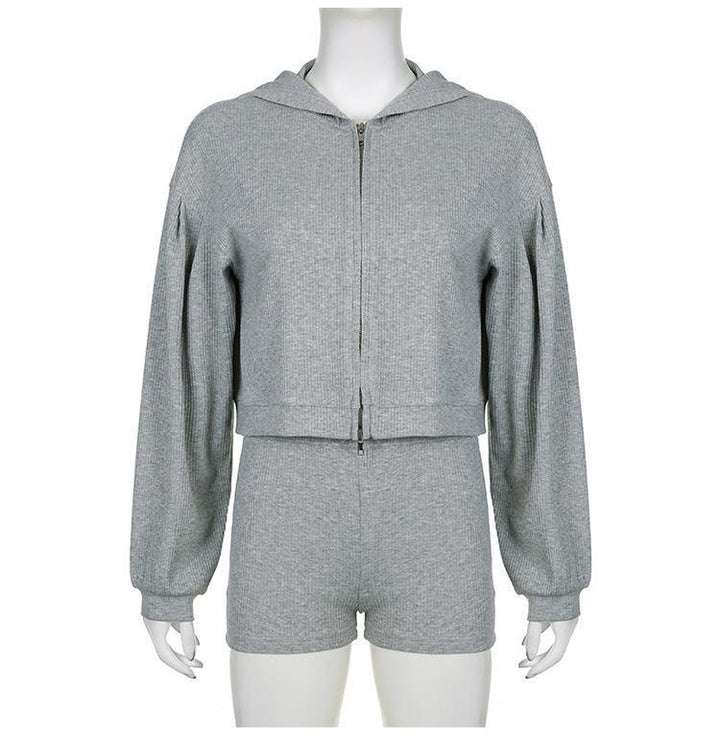 Gray ribbed knit zip-up hoodie with balloon sleeves and matching high-waist shorts on mannequin
