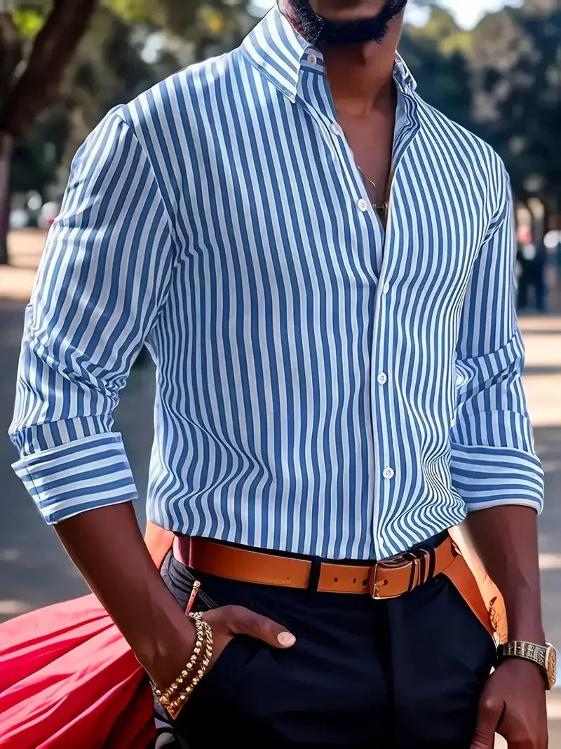 man wearing blue and white striped long sleeve shirt with brown belt and gold bracelet
