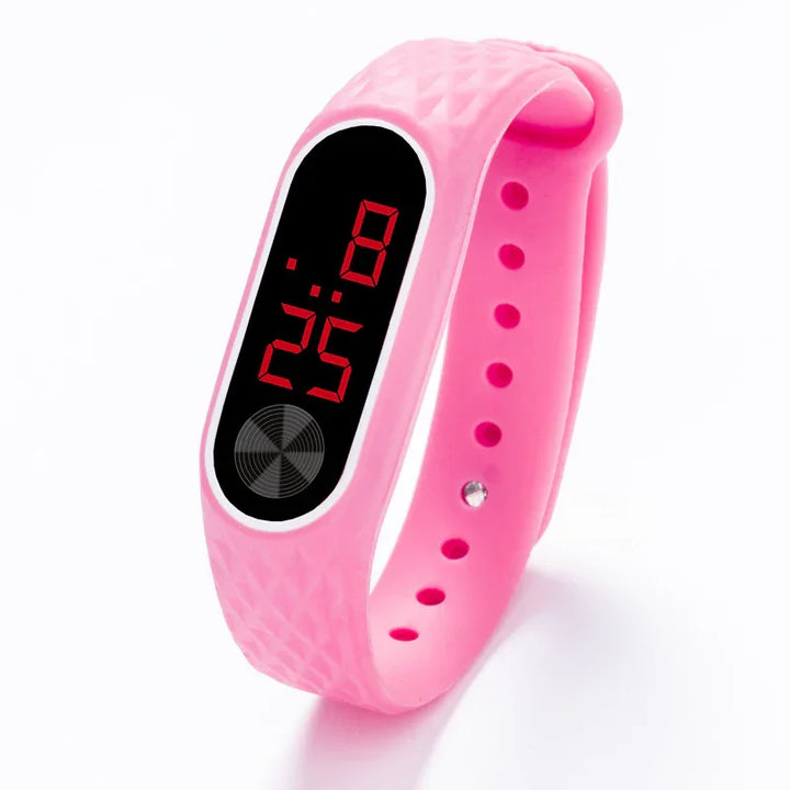 Pink digital LED wristwatch with adjustable textured silicone band showing time 8:25