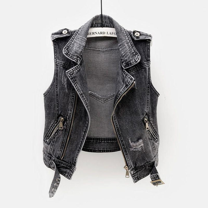 Black distressed denim sleeveless biker vest with zipper and buckle details on hanger