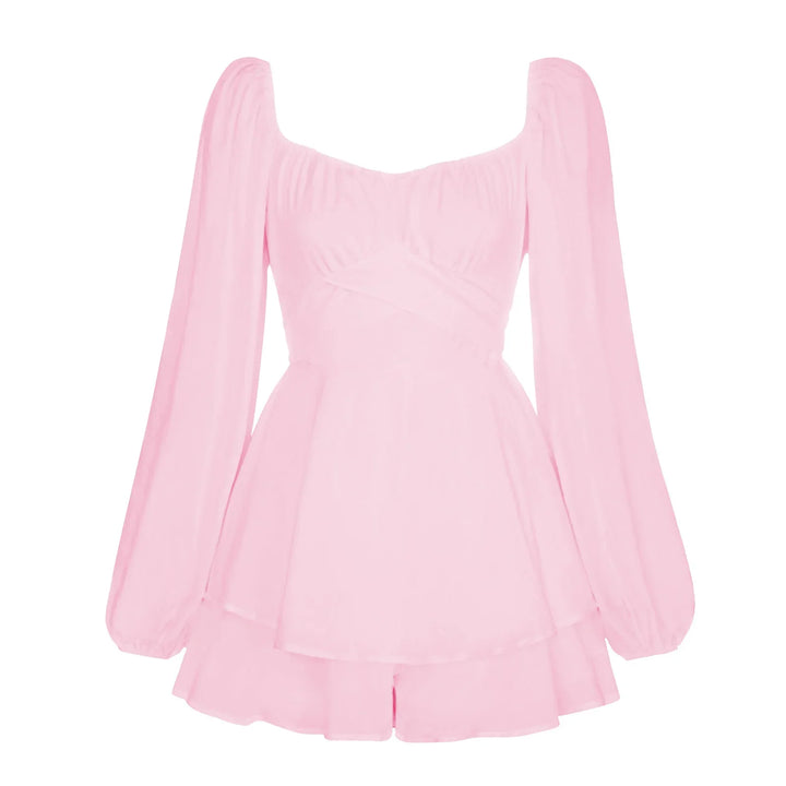 Pink long-sleeve romper with square neckline and flowy layered skirt design