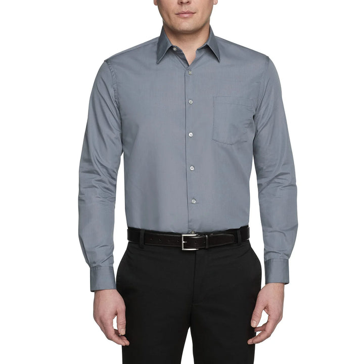 Man wearing light gray long sleeve dress shirt with chest pocket and black pants with belt