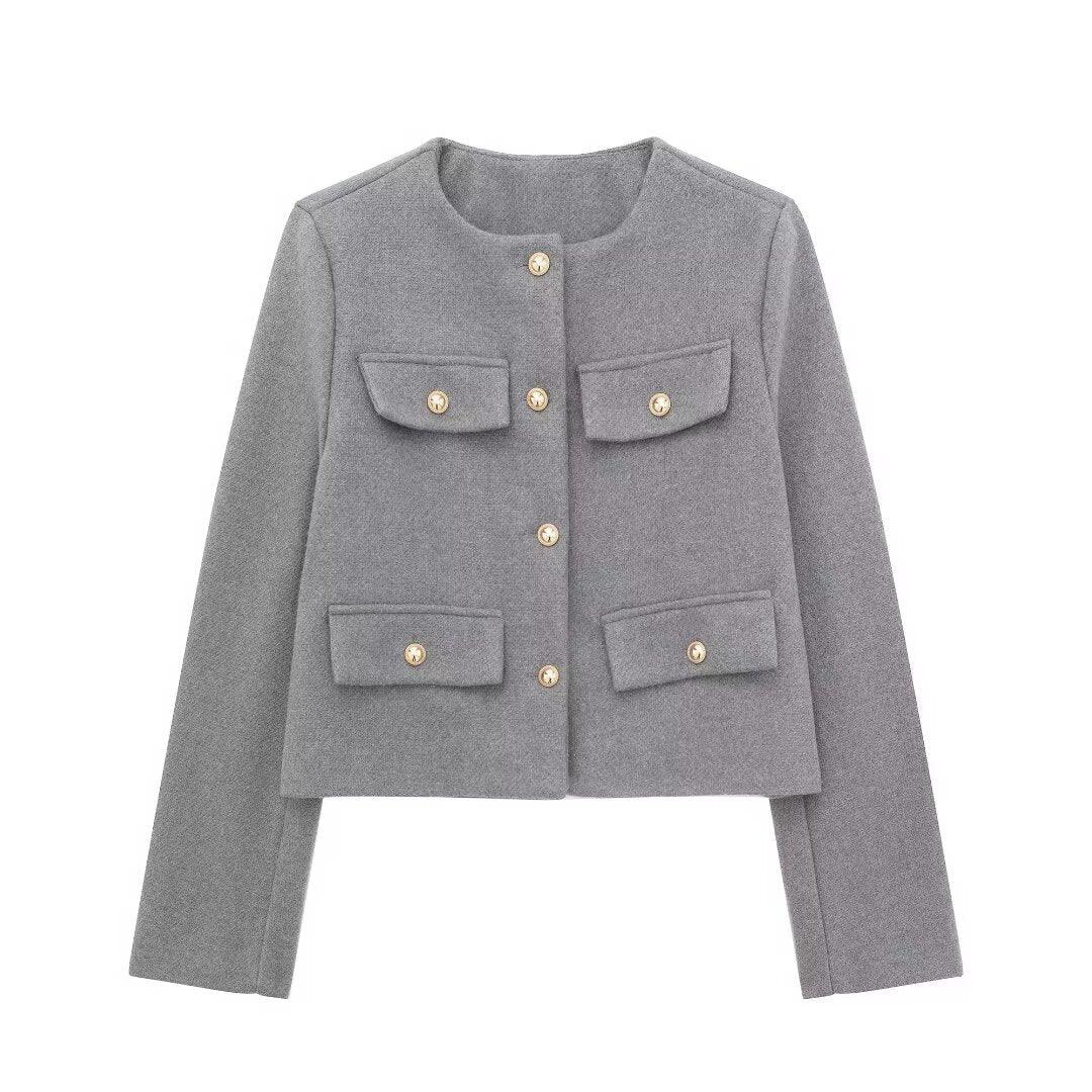 Grey cropped wool jacket with round neck, four front flap pockets, and gold buttons