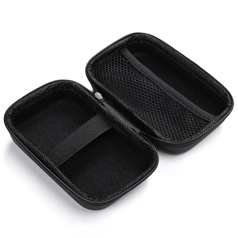 Black hard shell zippered carrying case with mesh pocket and elastic strap, open on white background