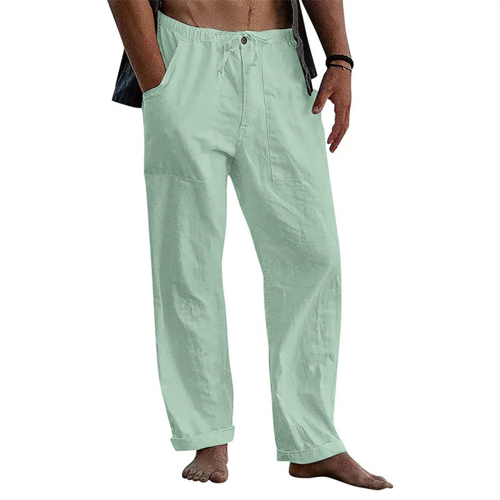 Men's light green casual linen pants with elastic waistband and rolled cuffs