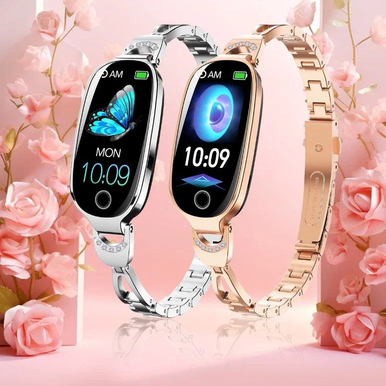 Elegant silver and rose gold smartwatches with butterfly and digital display, floral pink background