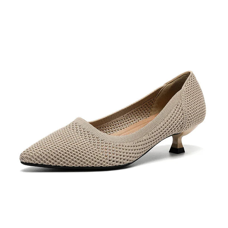 Beige knit pointed-toe kitten heel shoe with textured fabric upper and low heel