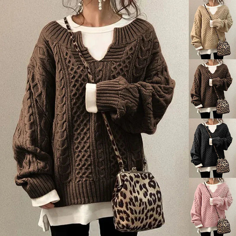 Woman wearing oversized cable knit sweater in brown with leopard print crossbody bag, styled with white inner shirt