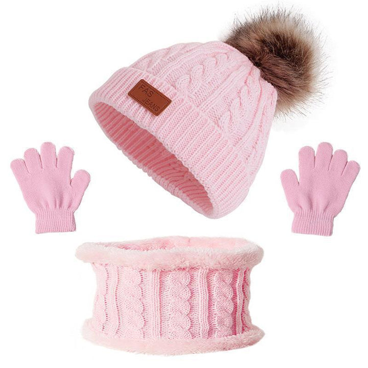 Pink knitted winter set with pom pom beanie, gloves, and a fleece-lined neck warmer