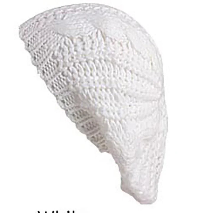 White knitted crochet beret hat with textured pattern on a white background