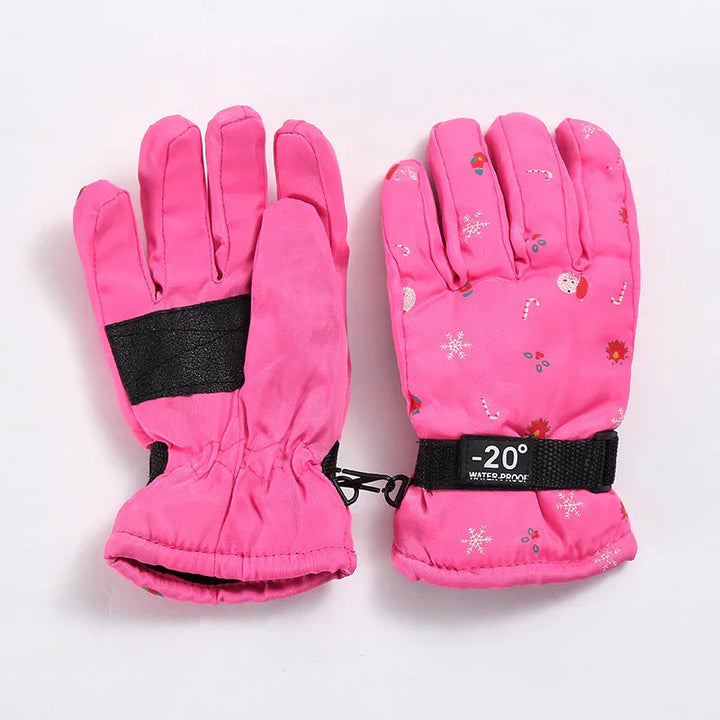 Pink waterproof winter gloves with snowflake and candy cane print and -20° label