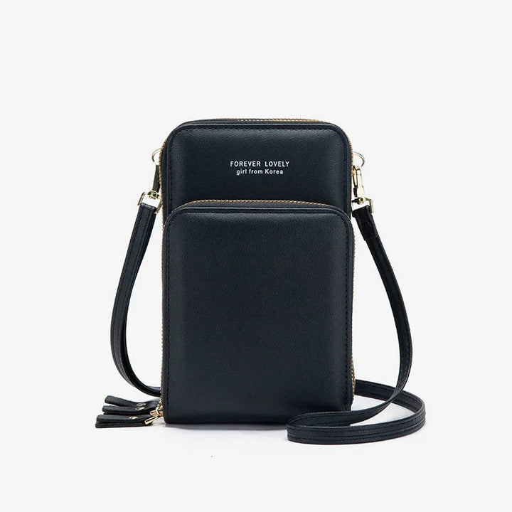 Black leather crossbody bag with gold zippers and strap, featuring text 'Forever Lovely girl from Korea'