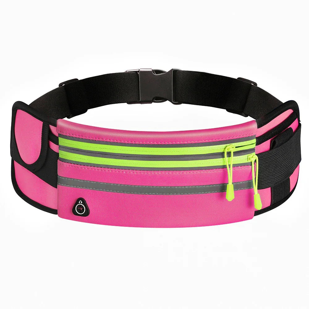 Pink running belt with two green zipper pockets and adjustable black strap