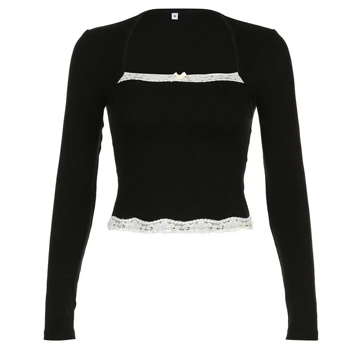 Black long-sleeve crop top with white lace trim and small front bow detail