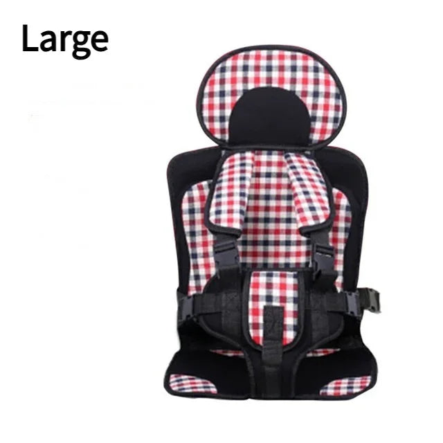 Large child car seat with red, white, and blue plaid cushion and black straps