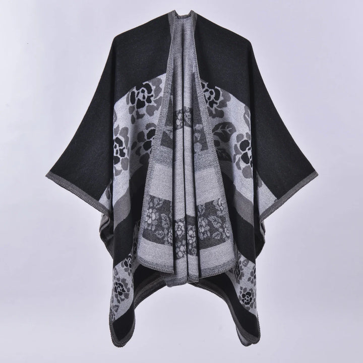 Black and gray floral patterned knit shawl with wide sleeves and draped front