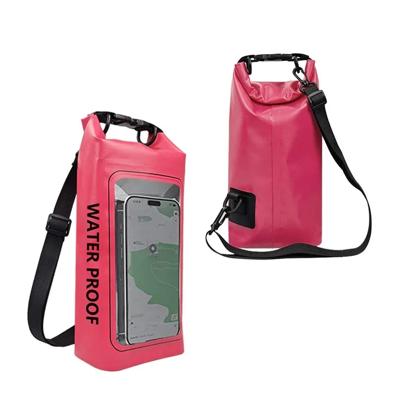 Pink waterproof dry bag with phone holder and black shoulder strap on white background