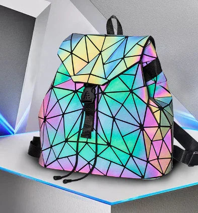 Colorful geometric pattern backpack with black buckle and adjustable straps on white display