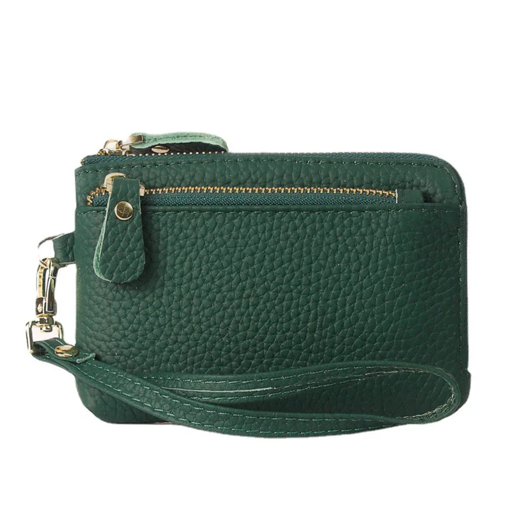 Green pebbled leather wristlet wallet with gold zipper and detachable strap