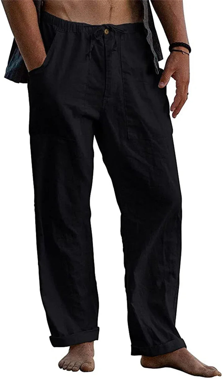 Men's black casual linen pants with button and elastic waist, featuring side pockets and cuffed hems