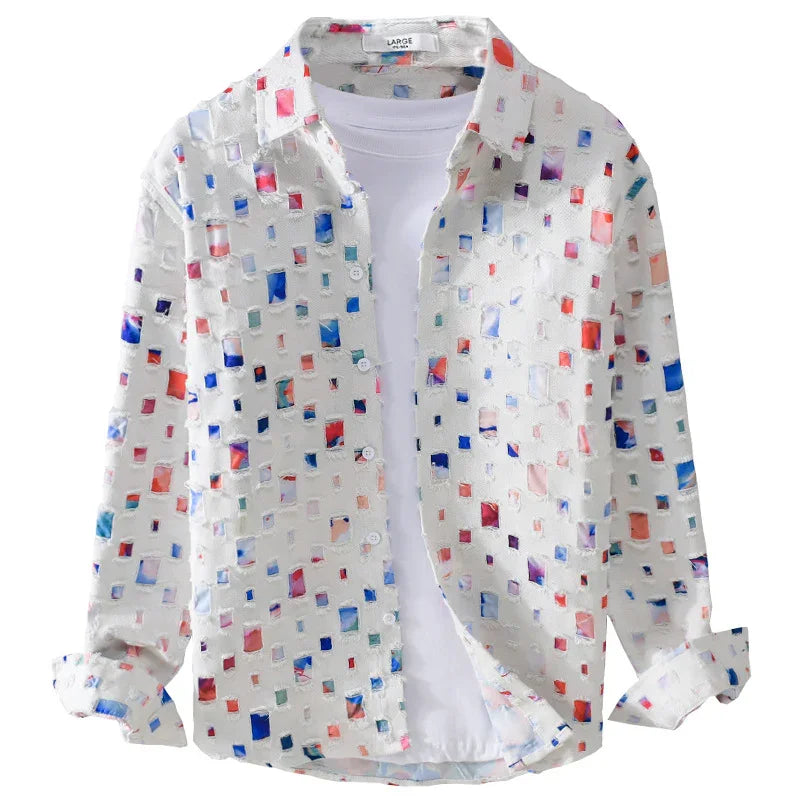 white patterned button-up shirt with colorful red, blue, and purple square designs over plain white t-shirt