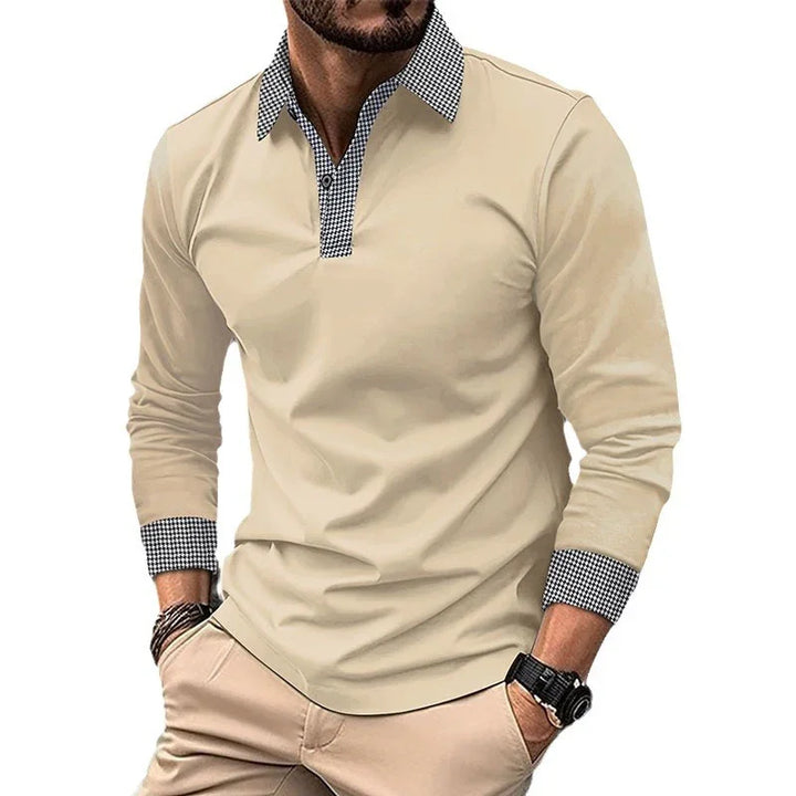 Men's beige long sleeve polo shirt with black and white checkered collar and cuffs, paired with beige pants