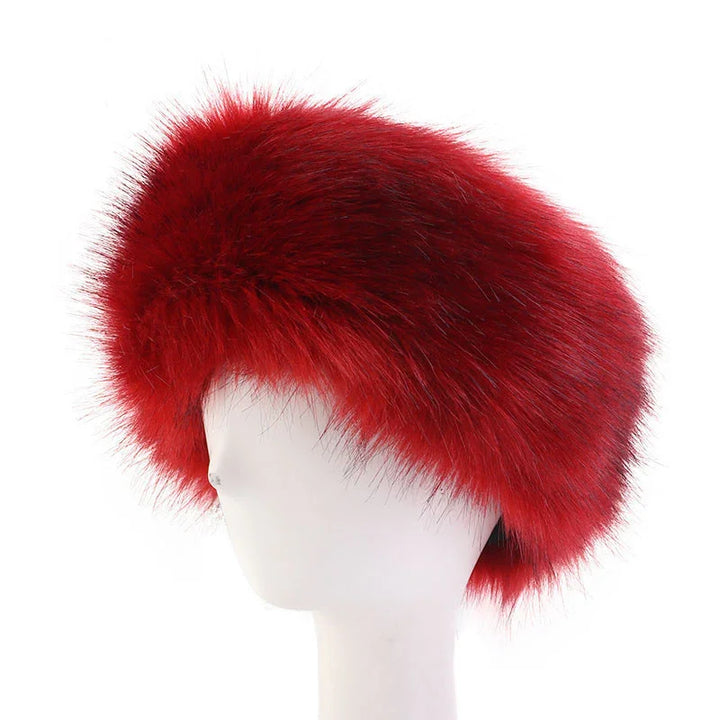 luxurious red fur hat displayed on white mannequin head, soft and fluffy texture
