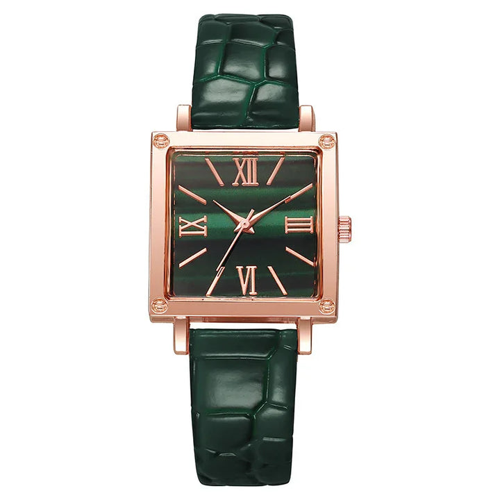 Square rose gold watch with green textured leather strap and green dial with Roman numerals