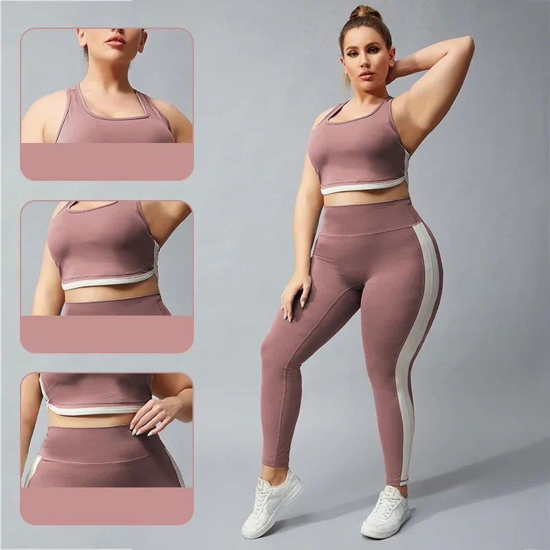 Plus size woman in mauve sports bra and leggings with white side stripes posing against gray background