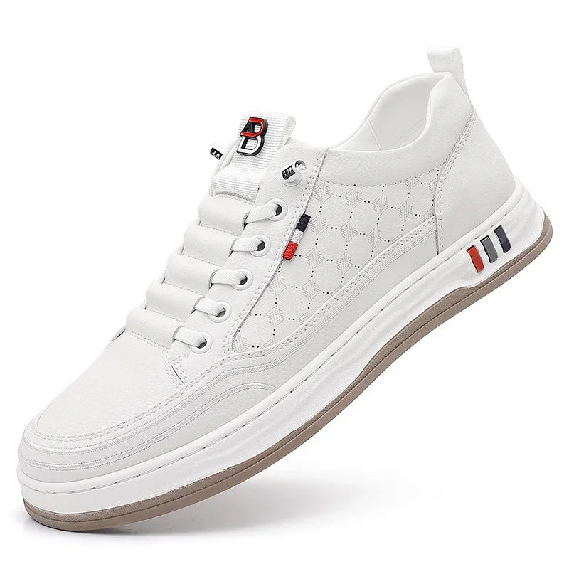 White casual sneaker with patterned side panels, red and navy accents, and beige sole