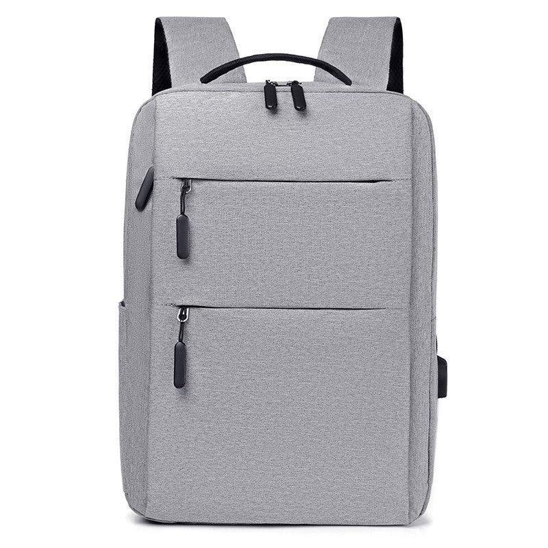 Modern light gray laptop backpack with multiple zippered compartments and sturdy shoulder straps