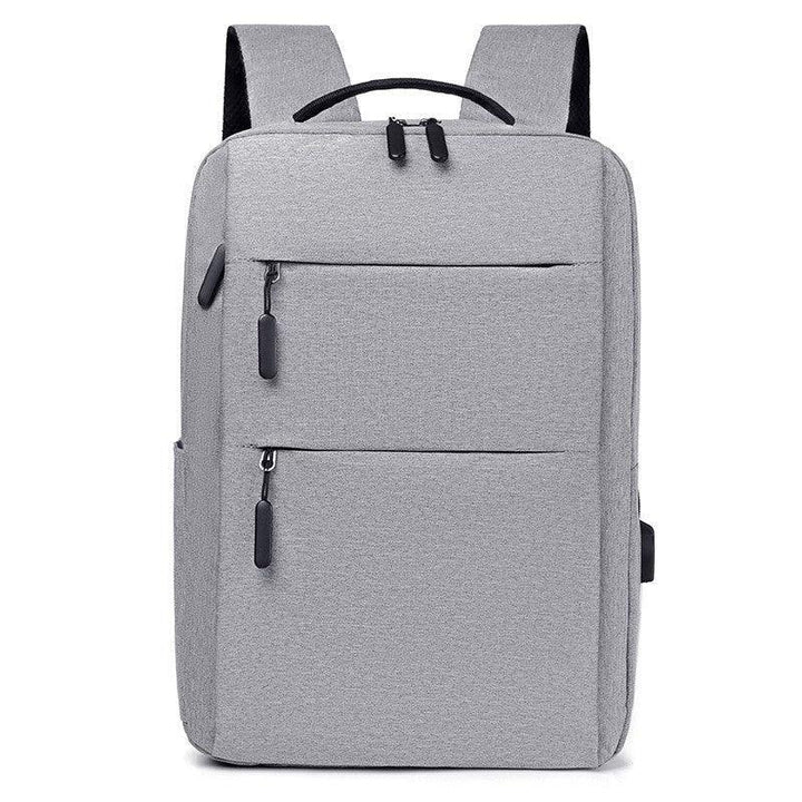 Modern light gray laptop backpack with multiple zippered compartments and sturdy shoulder straps
