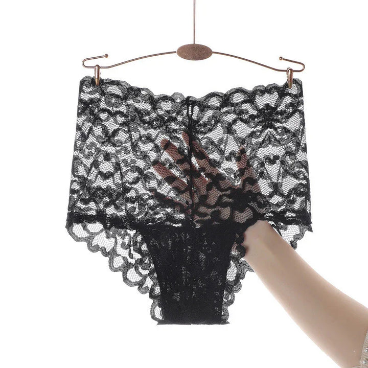 Black lace high-waisted women's underwear with floral pattern held on hanger