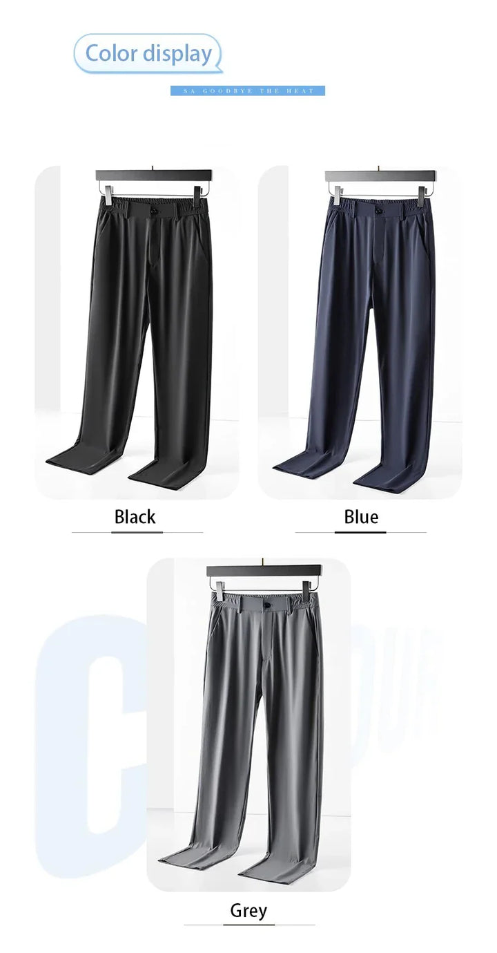 Black, blue, and grey men's casual trousers with button and elastic waist, displayed on hangers