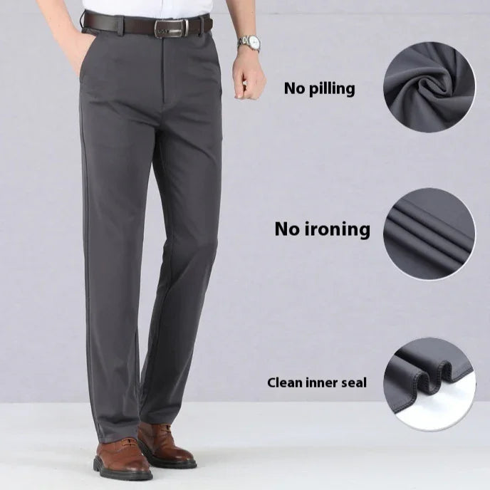 Men's gray dress pants with brown belt and shoes, features no pilling, no ironing, clean inner seal.
