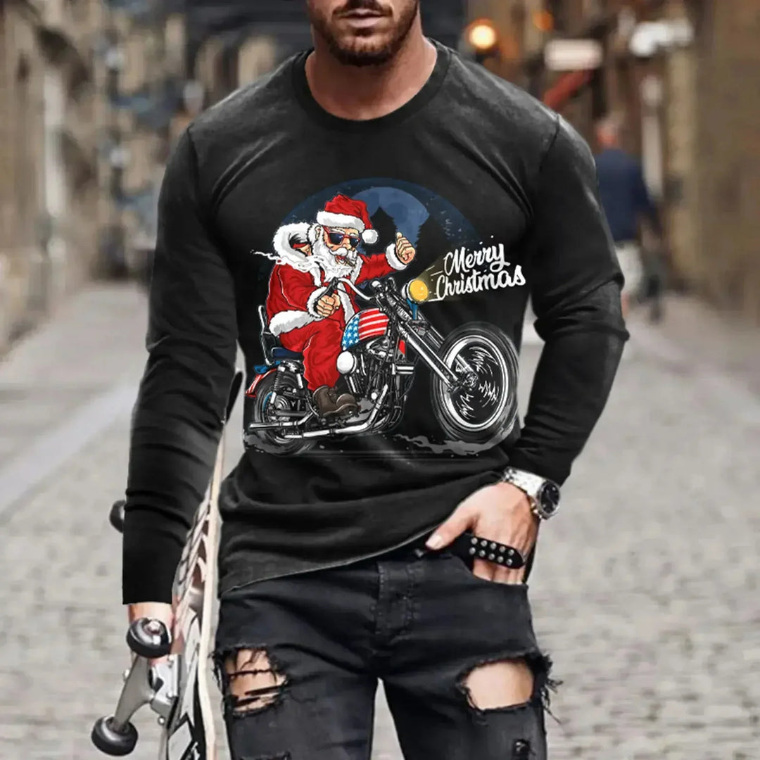 Man wearing a black Christmas sweatshirt with a graphic of Santa riding a motorcycle and Merry Christmas text