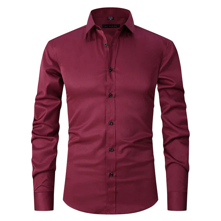 Men's slim fit maroon dress shirt with long sleeves and black buttons on white background