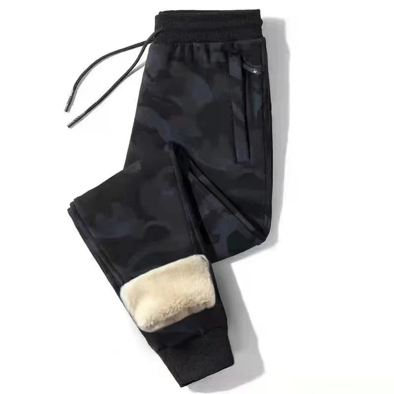 Black camo fleece-lined jogger pants with zippered pockets and drawstring waist