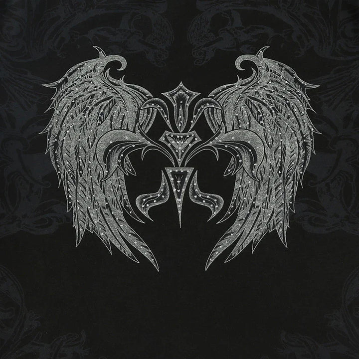 Intricate silver tribal wings design with ornamental patterns on black background